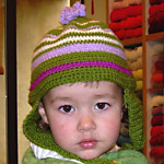 bimba con berretto in MerinoGold